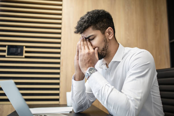 istock Tired worker in the office 1201429884