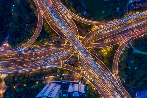 istock Urban highway traffic shanghai at night 1201430026