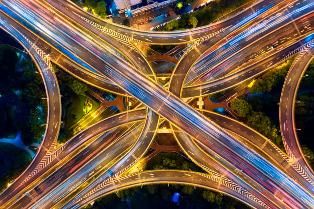 istock Urban highway traffic shanghai at night 1201430146