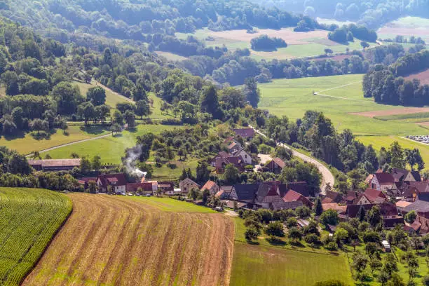 aerial view of a village named Baechlingen in Hohenlohe, Germany at late summer time