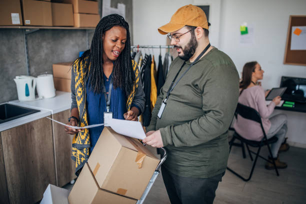 istock Diverse people arranging customers orders for drop shipping 1201435496