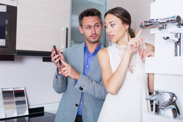 Couple choosing new mixer tap