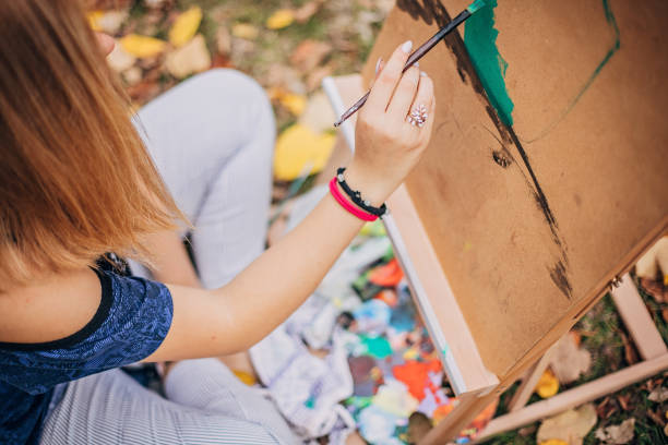 istock Young artist painting 1201436476