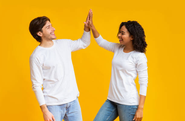 istock Loving Multiracial Couple Giving High Five To Each Other, Clapping Hands 1201436750
