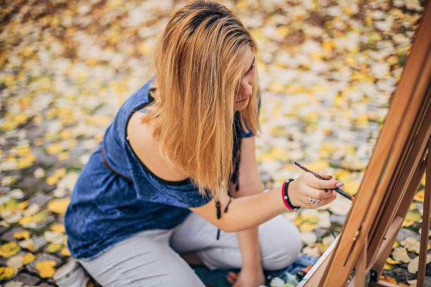 istock One blonde female artist 1201437586