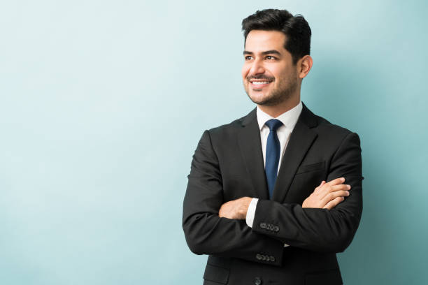 istock Confident Male Professional Smiling In Studio 1201437887
