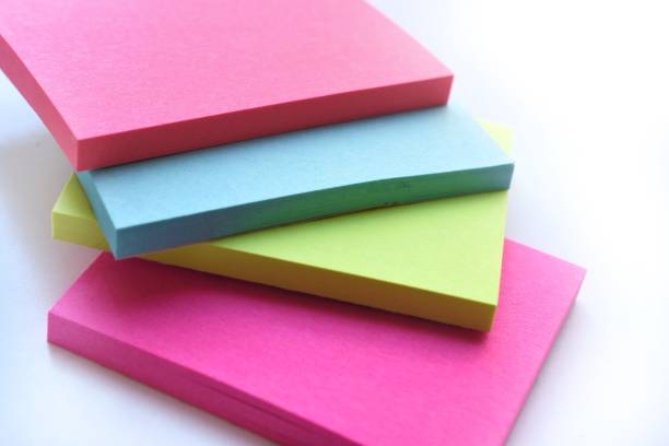 istock High Angle View Of Multi Colored Adhesive Notes Against White Background 1201438624