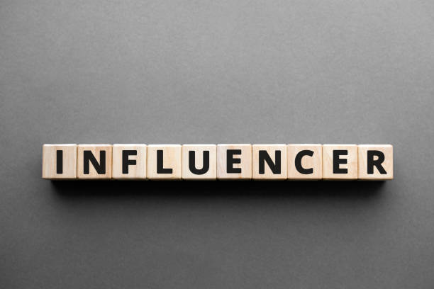 istock Influencer - words from wooden blocks with letters 1201438789