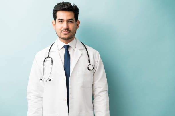 istock Medical Professional In Lab Coat And Stethoscope At Studio 1201438975