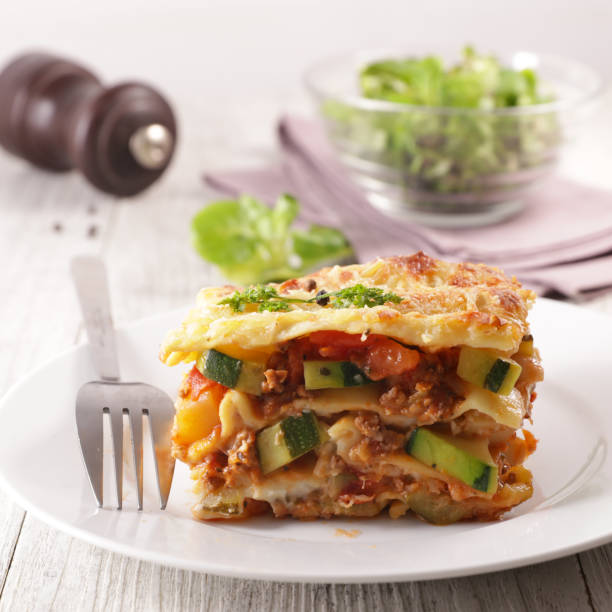istock plate of lasagna with minced beef, tomato sauce and vegetable 1201443121
