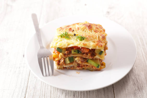 istock plate of lasagna with minced beef, tomato sauce and vegetable 1201443123
