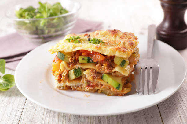 istock plate of lasagna with minced beef, tomato sauce and vegetable 1201443145
