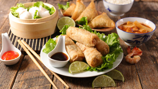 istock assorted of asian food- spring roll, noodles soup, dim sum 1201443154