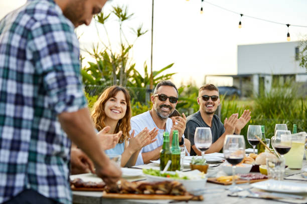 istock Happy friends celebrating Asado in backyard 1201443310
