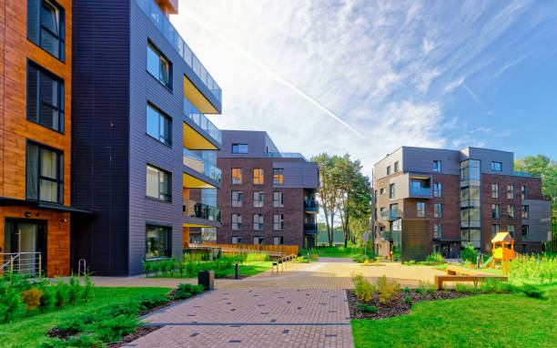 istock Benches at Modern european complex of apartment buildings reflex 1201443365