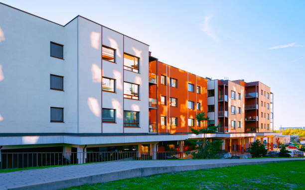 istock Apartment house residential home architecture with parking reflex 1201446304