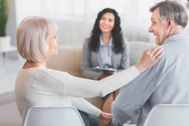 istock Happy mature couple reconciling after successful therapy 1201448649