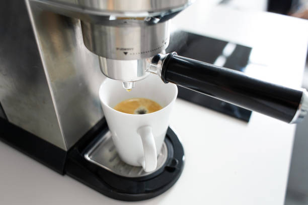 istock Close-up of making coffee in a coffee machine. 1201450107
