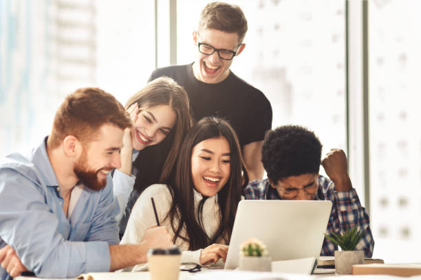 istock We did it. Euphoric students watching exam results on laptop 1201453081