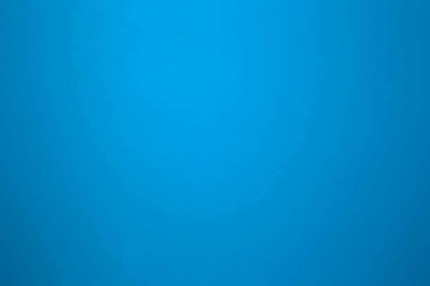 Aqua blue color on a solid stone wall as background texture. beautiful modern retro color close