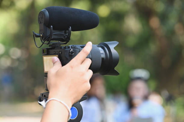 istock The photographer Video camera operator on stabilizers working with his equipment to pay close attention to take a photo. 1201456954