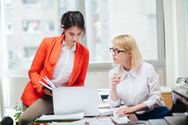 Two women in office