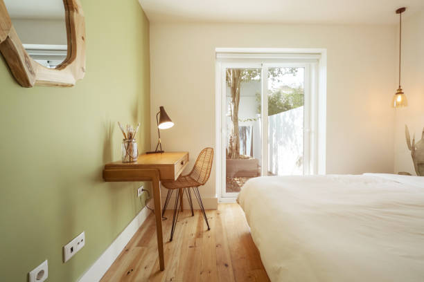 istock Modern apartment interior design, simple desk in front of window and terrace 1201458548