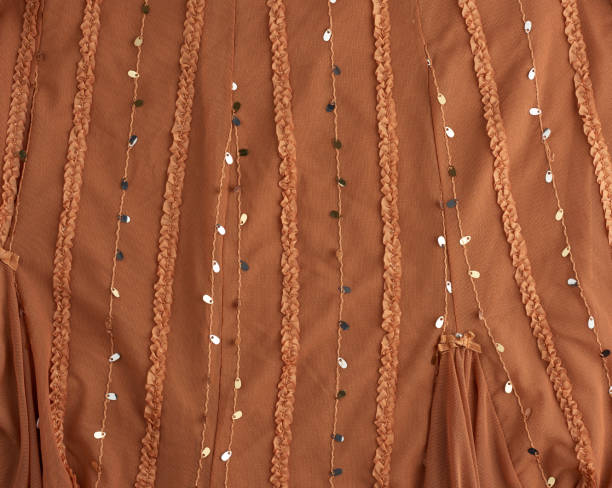 istock brown tulle with sequin embroidery and decor, textile for sewing clothes 1201459355