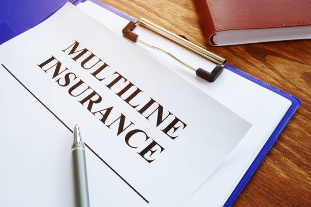 istock Multiline Insurance agreement and pile of papers. 1201461316