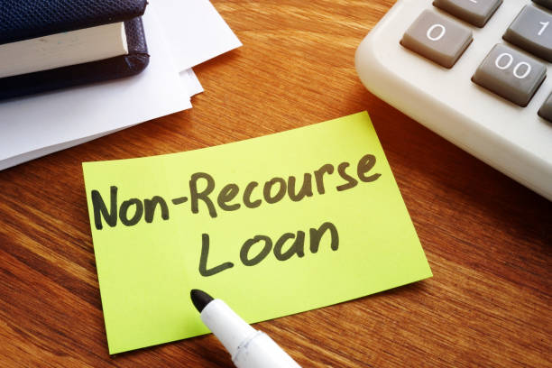 istock Non-Recourse Loan sign on sheet and calculator. 1201462051