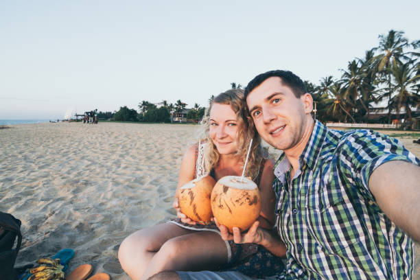 istock Couple taking selfie at tropical beach in Sri Lanka 1201462286