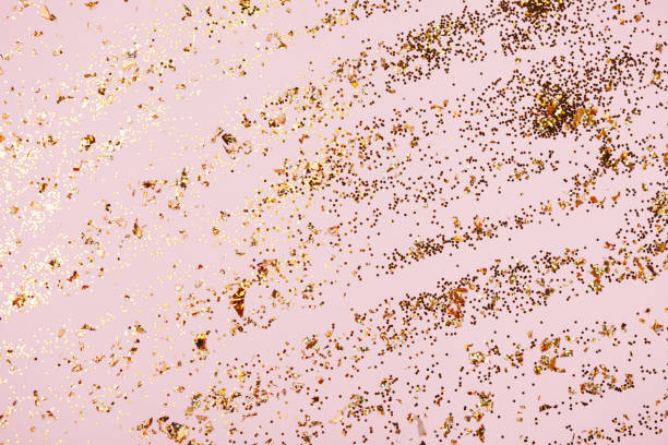 istock Pink confetti and stars and sparkles on pink background. 1201464614