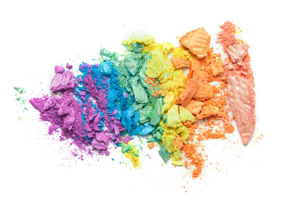 istock A broken rainbow colored eye shadow smear, make up palette isolated on a white background. 1201464643