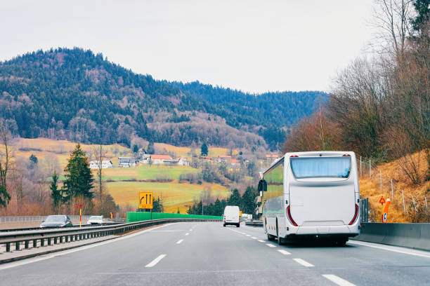 istock White touristic bus in road on highway 1201465950