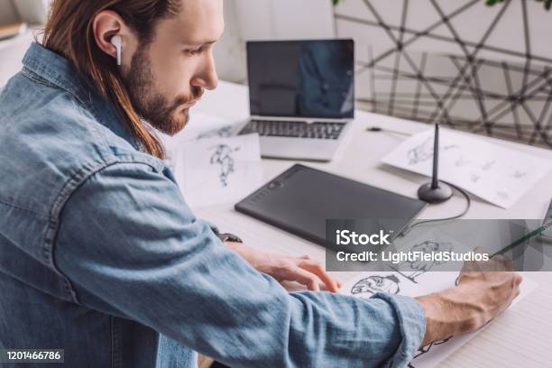 Bearded Of Illustrator In Wireless Earphone Drawing Sketches Stock Photo - Download Image Now