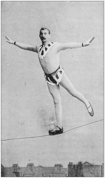 ilustrações, clipart, desenhos animados e ícones de foto antiga: acrobata de andarilho de corda - tightrope walking circus skill