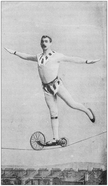 ilustrações, clipart, desenhos animados e ícones de foto antiga: acrobata de andarilho de corda - tightrope walking circus skill