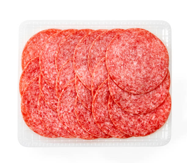istock sliced cervelat sausage for on a sandwich isolated on white. 1201467631