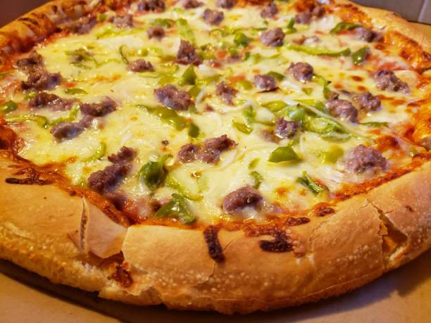 istock Sausage Pepper Onion Cheese Pizza 1201472130