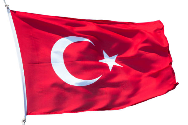 istock Turkish flag flutters against the blue sky. 1201473923