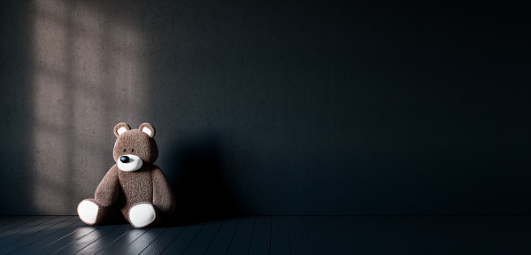 Child abuse and loneliness concept. Teddy bear sitting alone in dark room 3d render 3d illustration