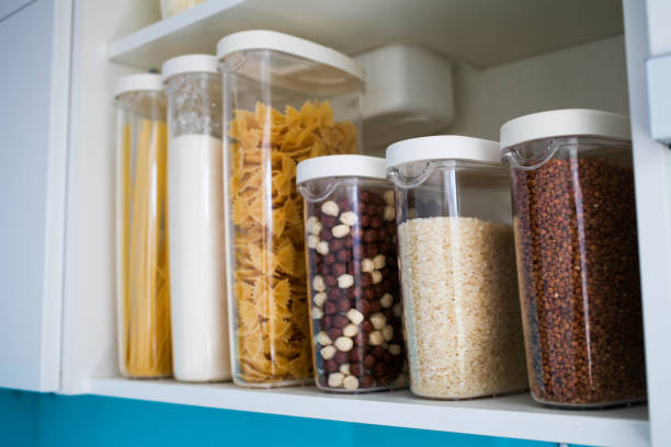 istock The organization and storage in kitchen of a case with grain in plastic containers. 1201485816