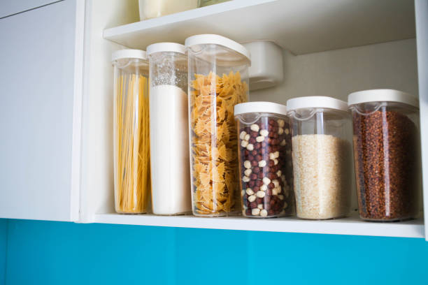 istock The organization and storage in kitchen of a case with grain in plastic containers. 1201485820