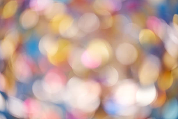 istock Festive blur background. Abstract twinkled bright background with bokeh defocused golden lights 1201490405