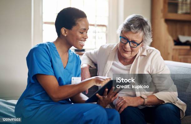 You Can Reach Me Anytime Online Stock Photo - Download Image Now - Nurse, Senior Adult, Patient