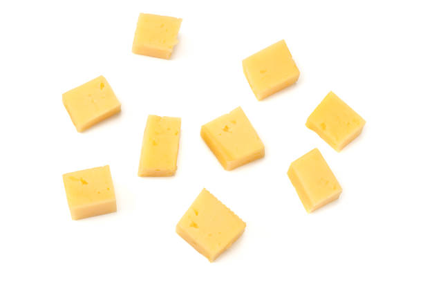istock cheese slices isolated on white background. top view 1201492664