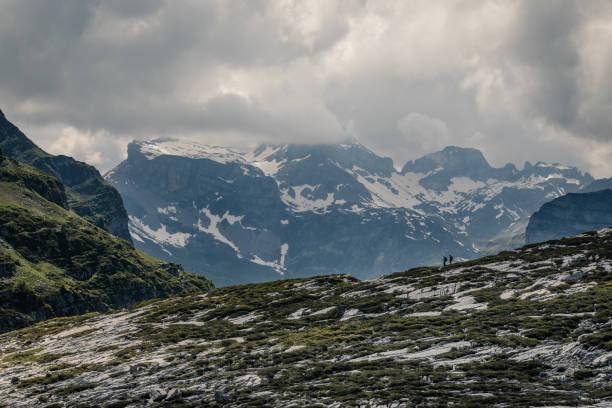 istock Hikers in the Swiss Alps 1201492689