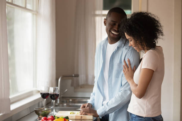istock Happy biracial couple enjoy romantic date together 1201492896