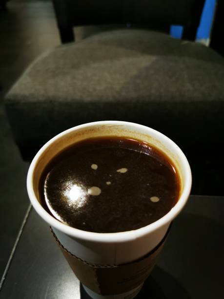 istock The fresh brew hot black coffee in paper cup 1201497129