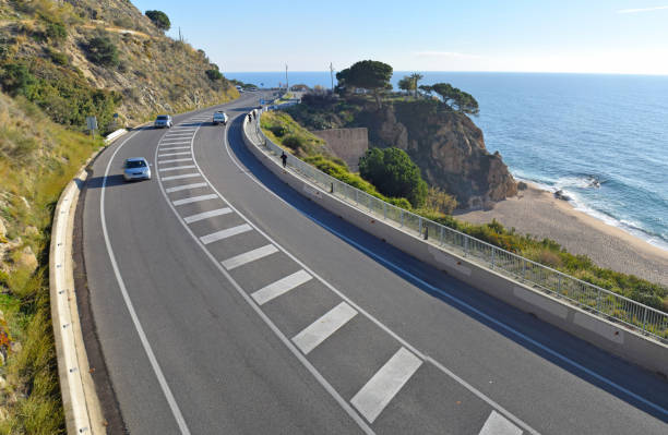 istock Road and cliff in Calella de la Costa, Spain 1201497316